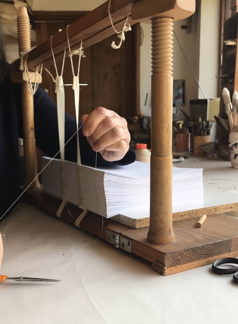 Hand-sewn binding process