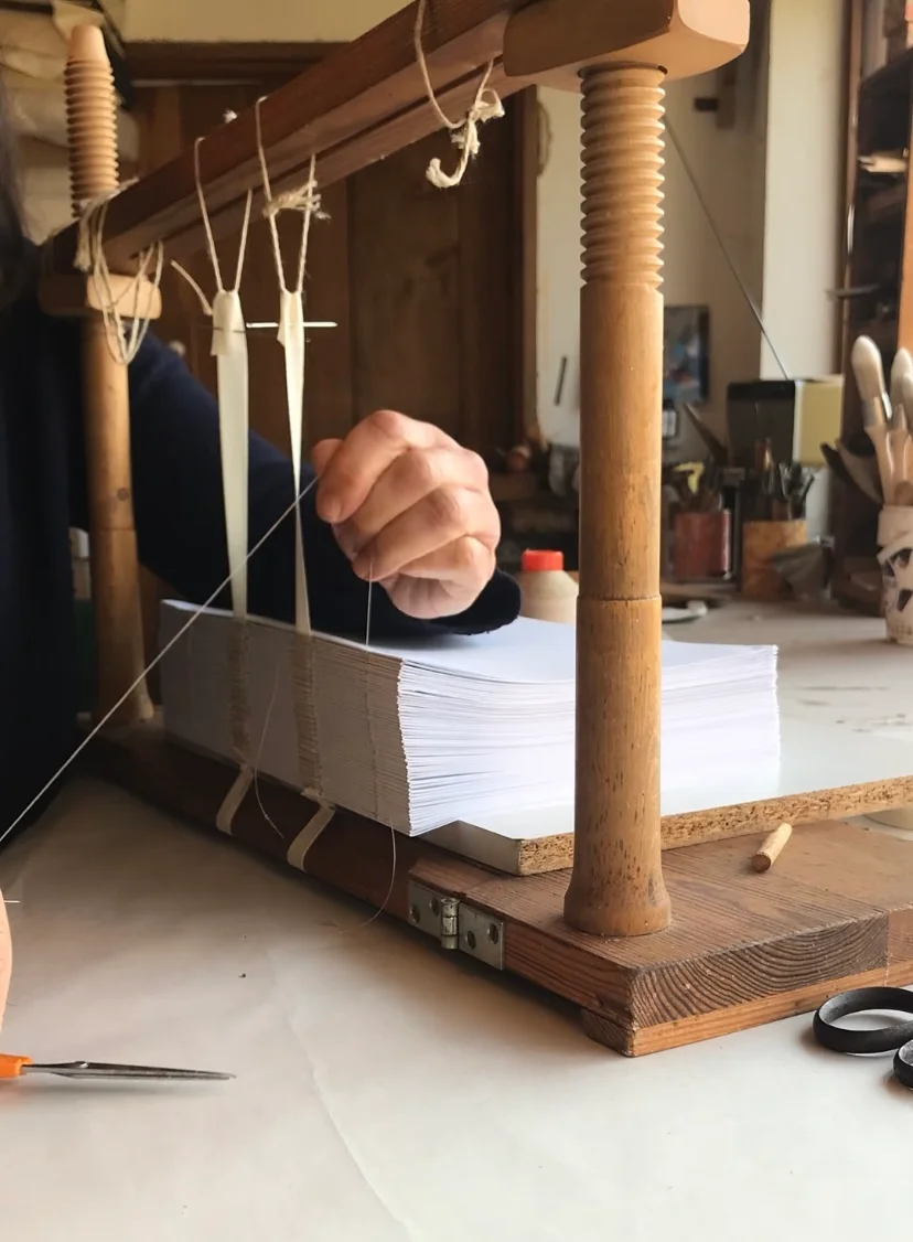 Hand-sewn binding process